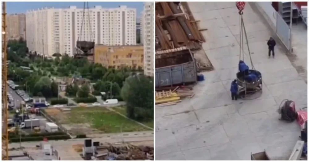 В Мытищах заметили строителей, спустившихся с высоты в чаше для бетона: видео